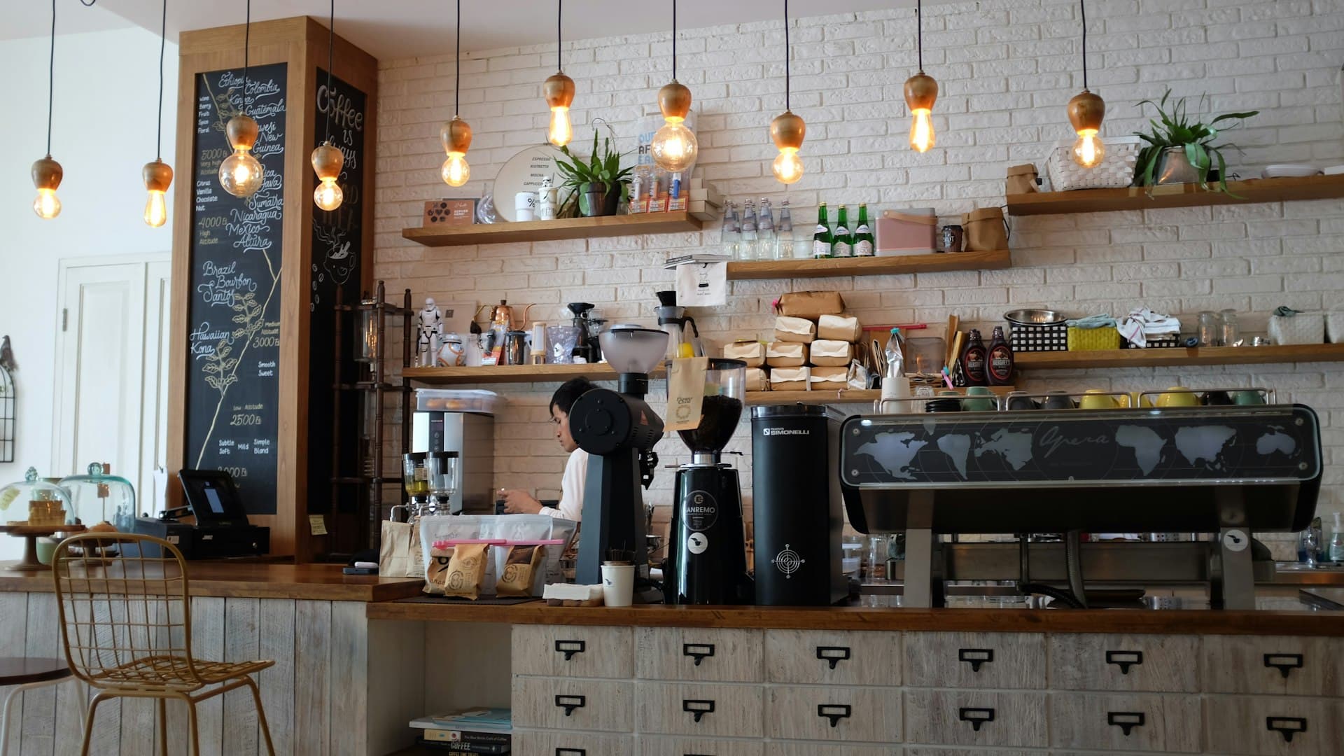 Sunlit cafe interior with a warm timber counter